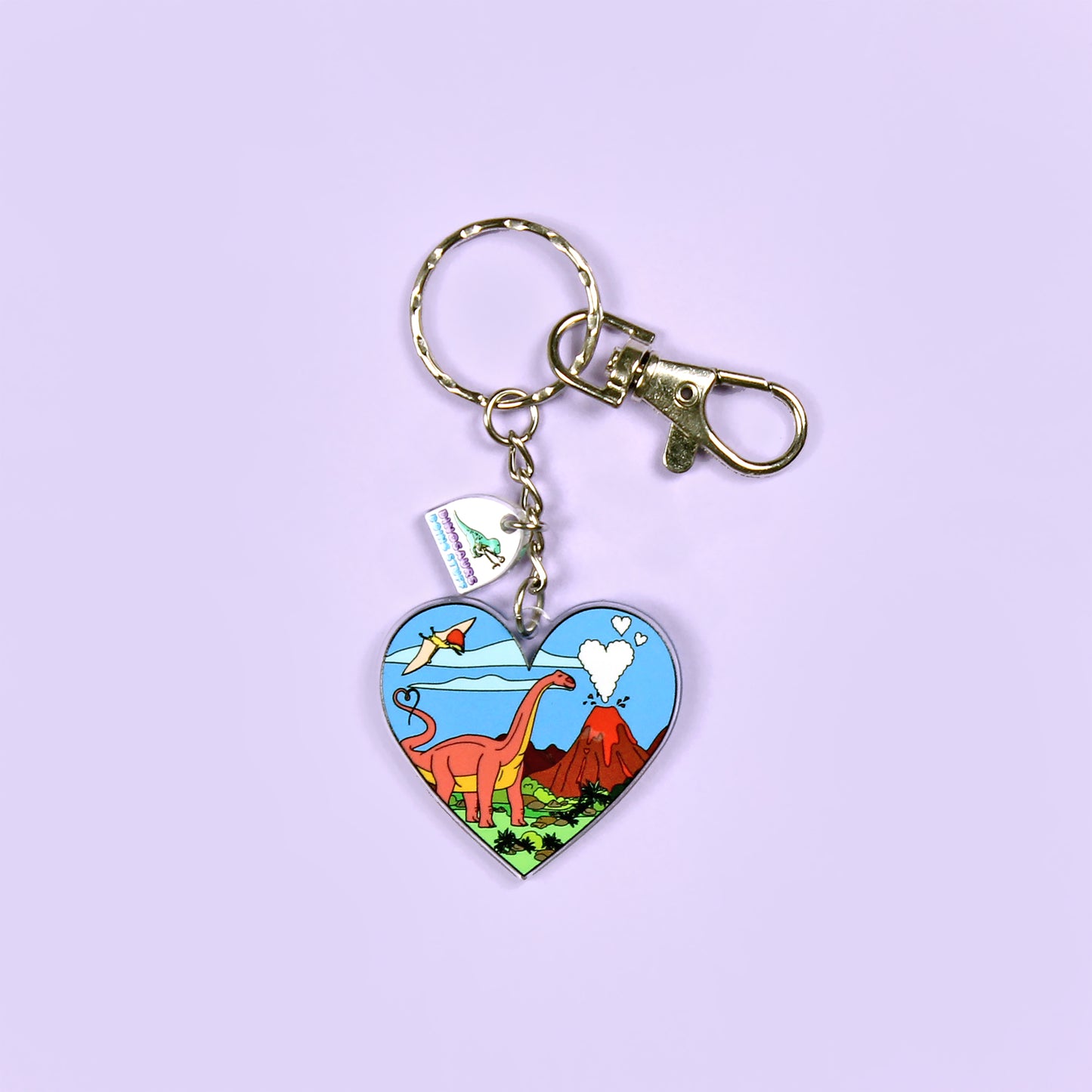 Heart Dinosaur Keyring on a purple background