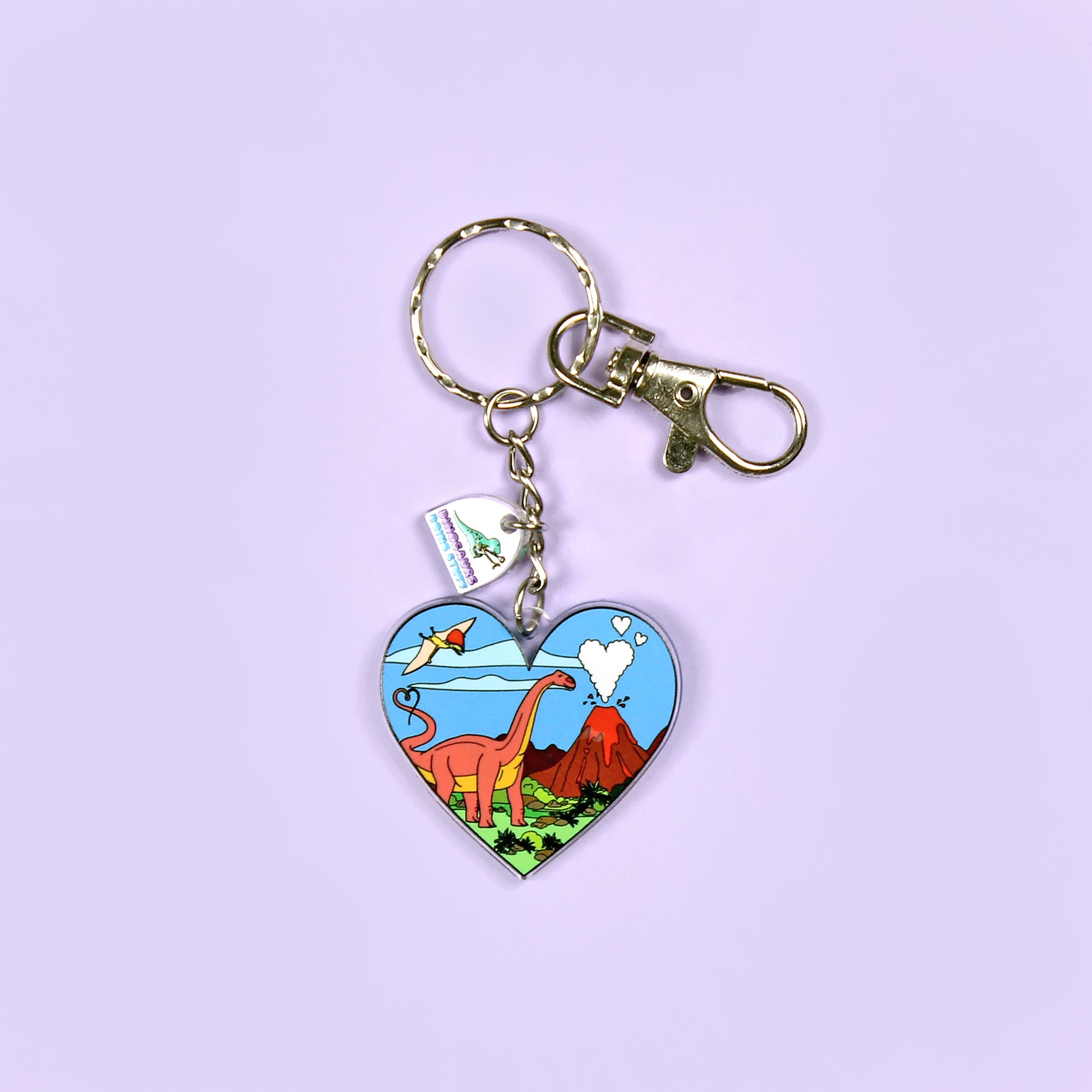 Heart Dinosaur Keyring on a purple background