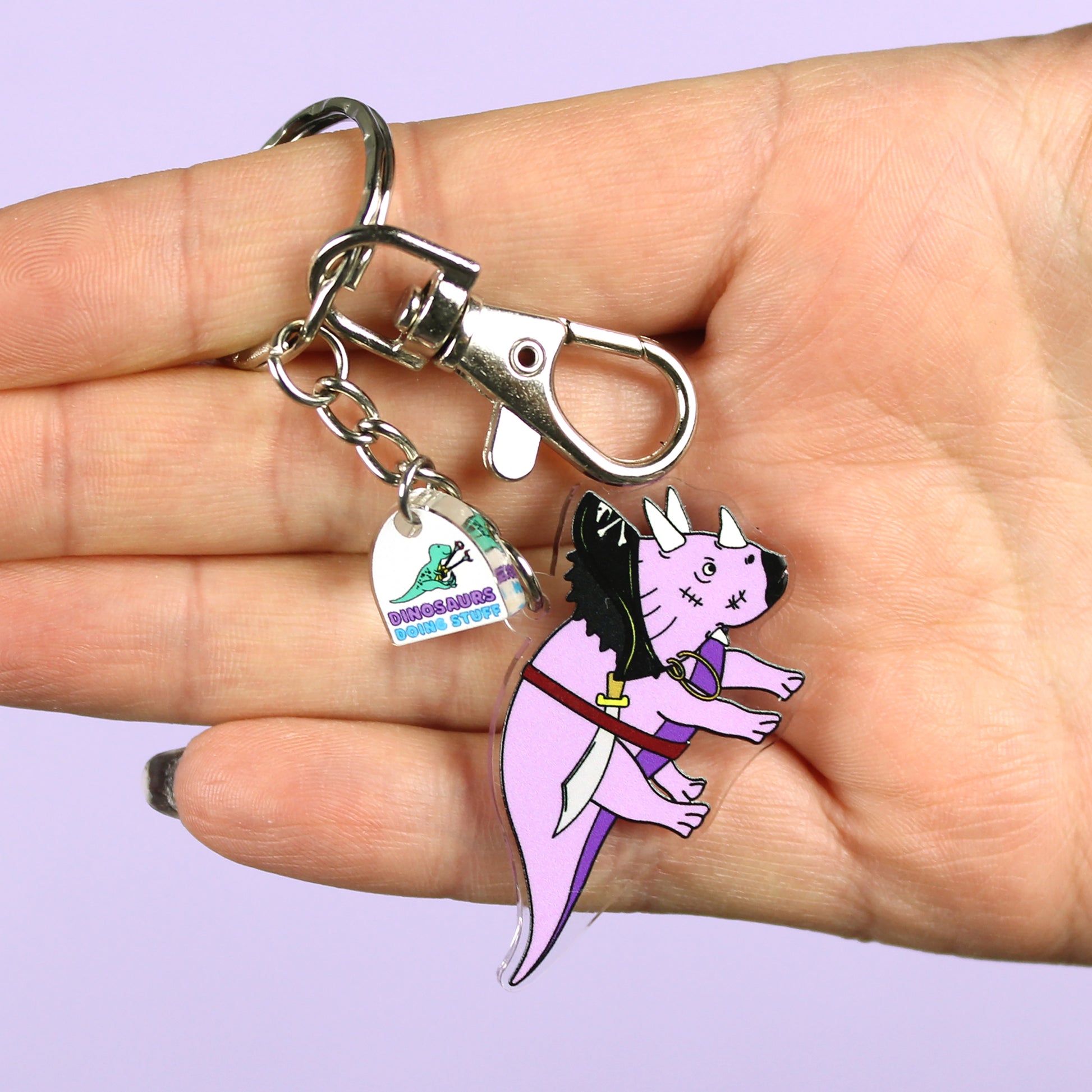 Pirate Dinosaur Keyring on a hand