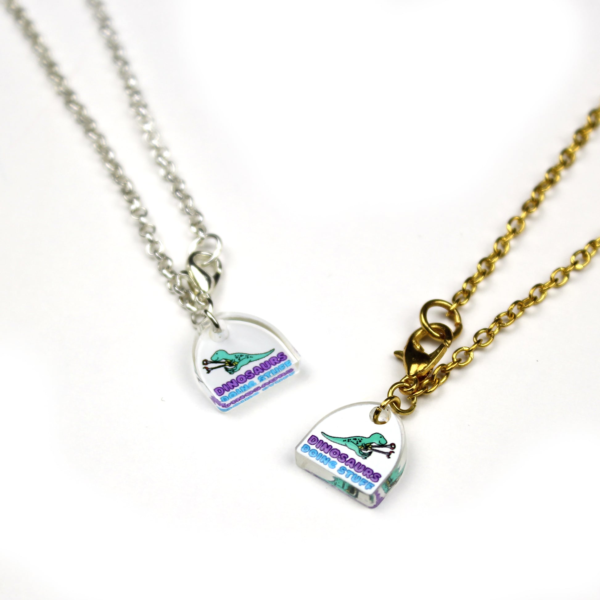 mini Dinosaurs Doing Stuff logo charm