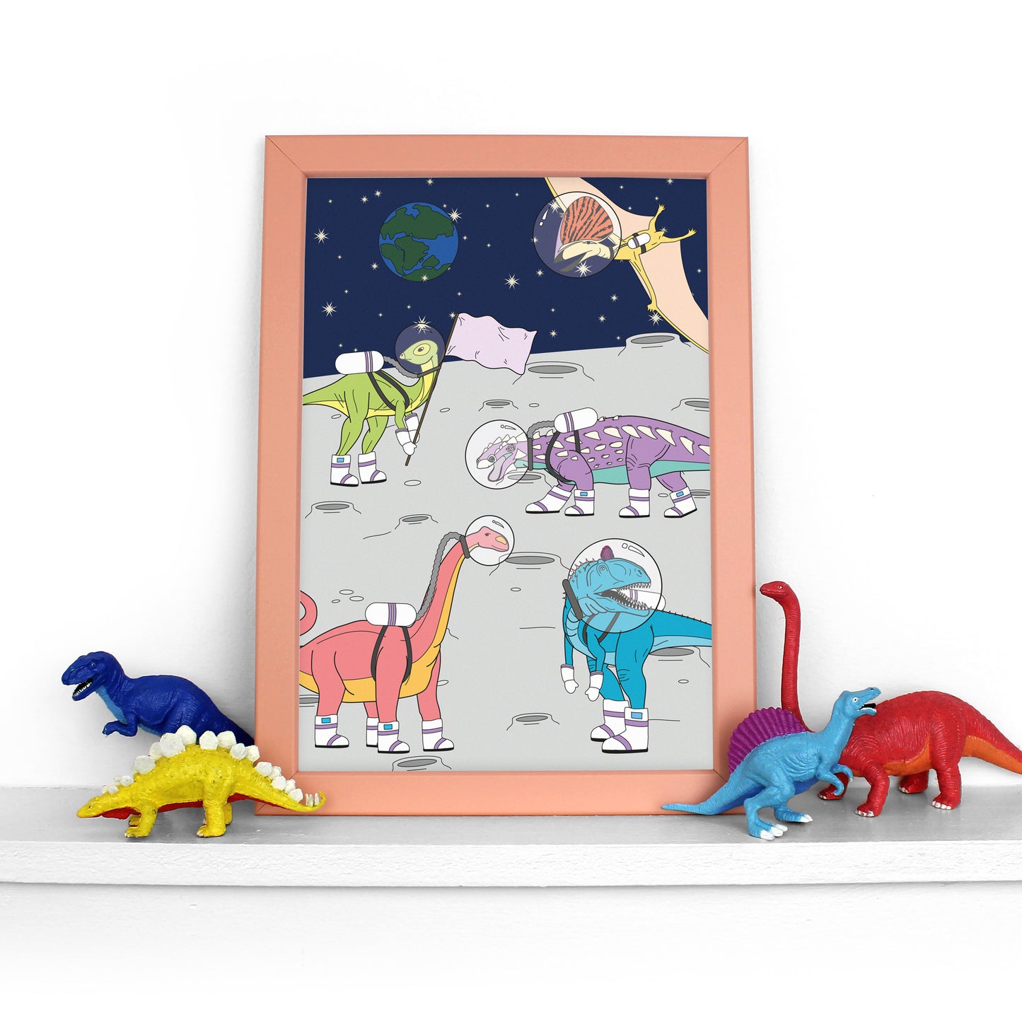 dinosaur space print in peach frame