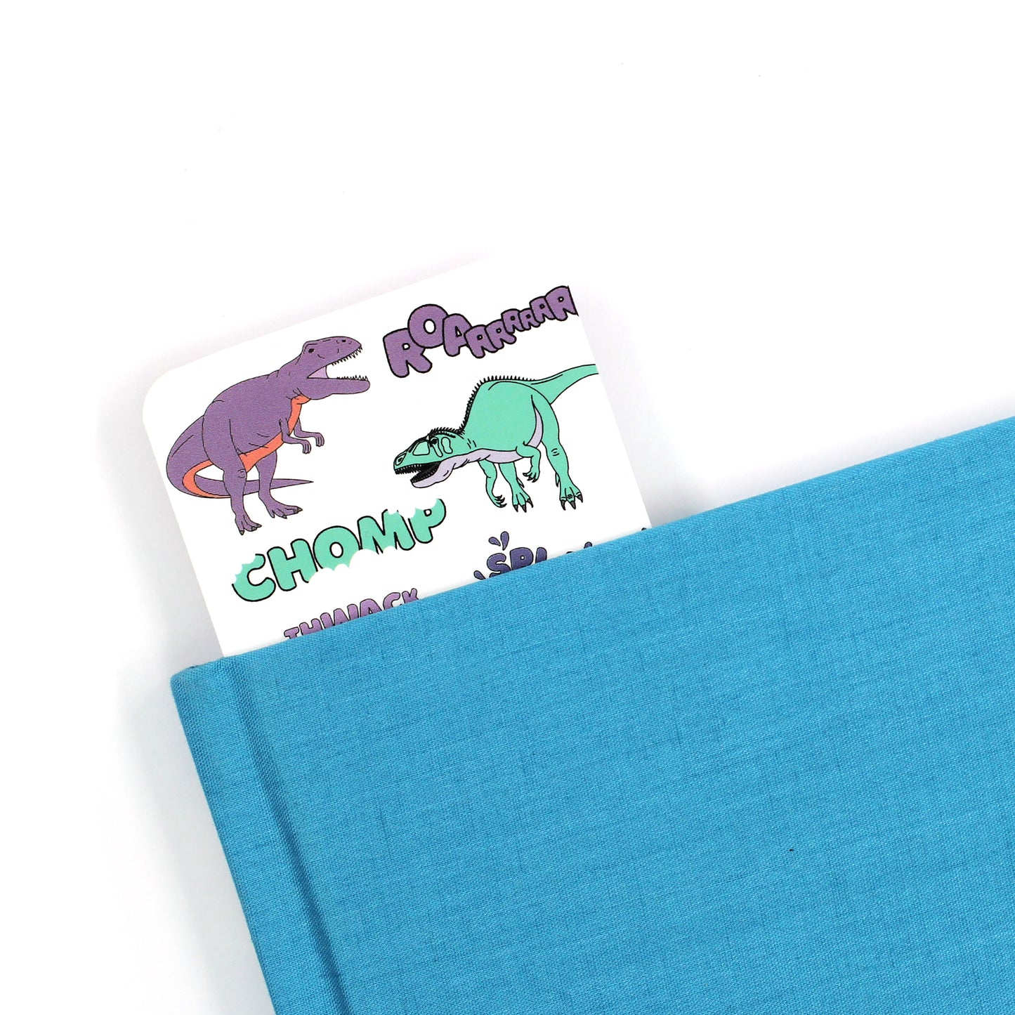 dinosaur words bookmark coming out of a blue book