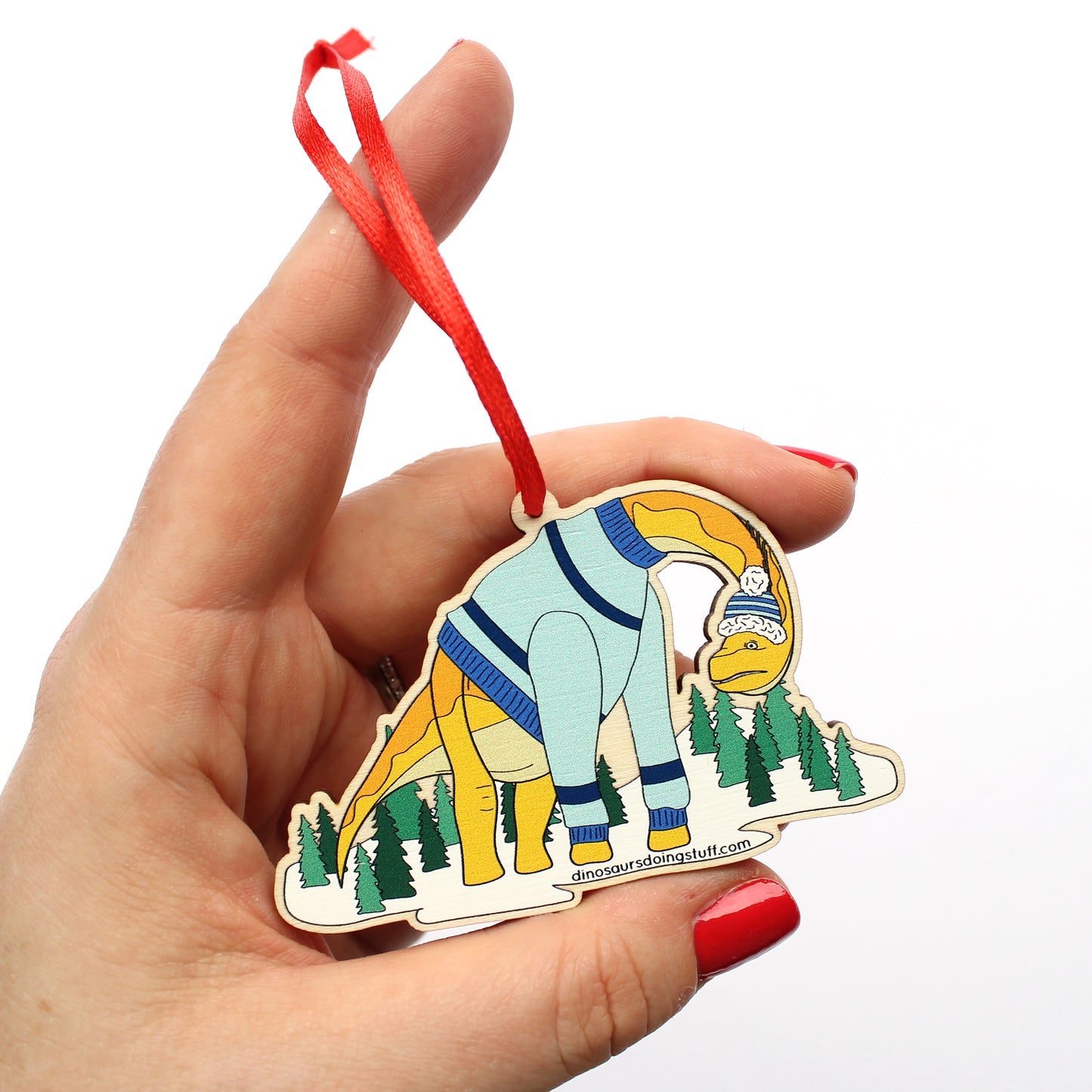 hand holding a wooden ugly Christmas jumper decoration