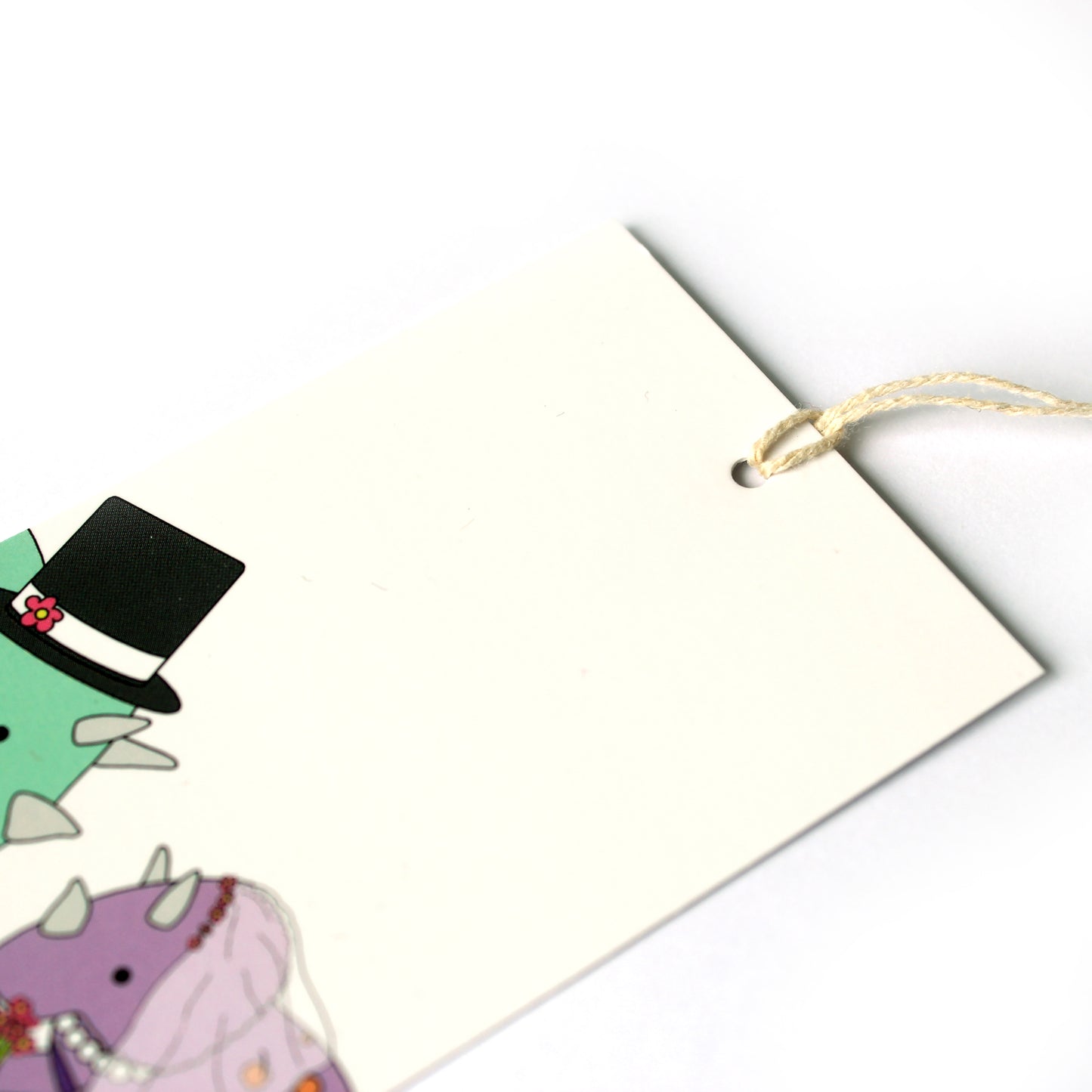 Wedding dinosaur gift tag close up