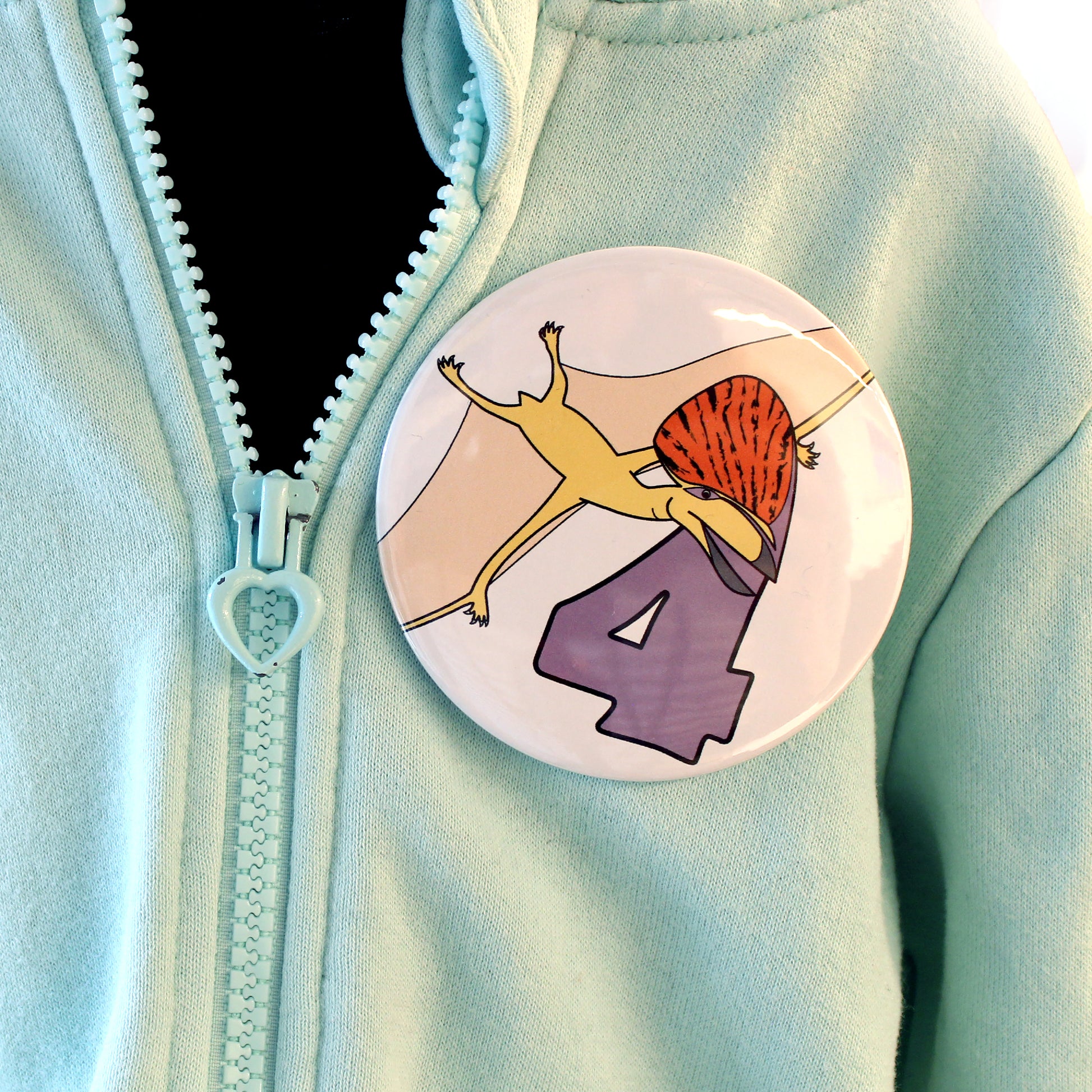dinosaur number 4 badge