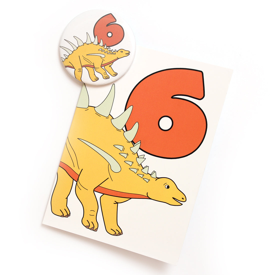 number 6 dinosaur card and badge