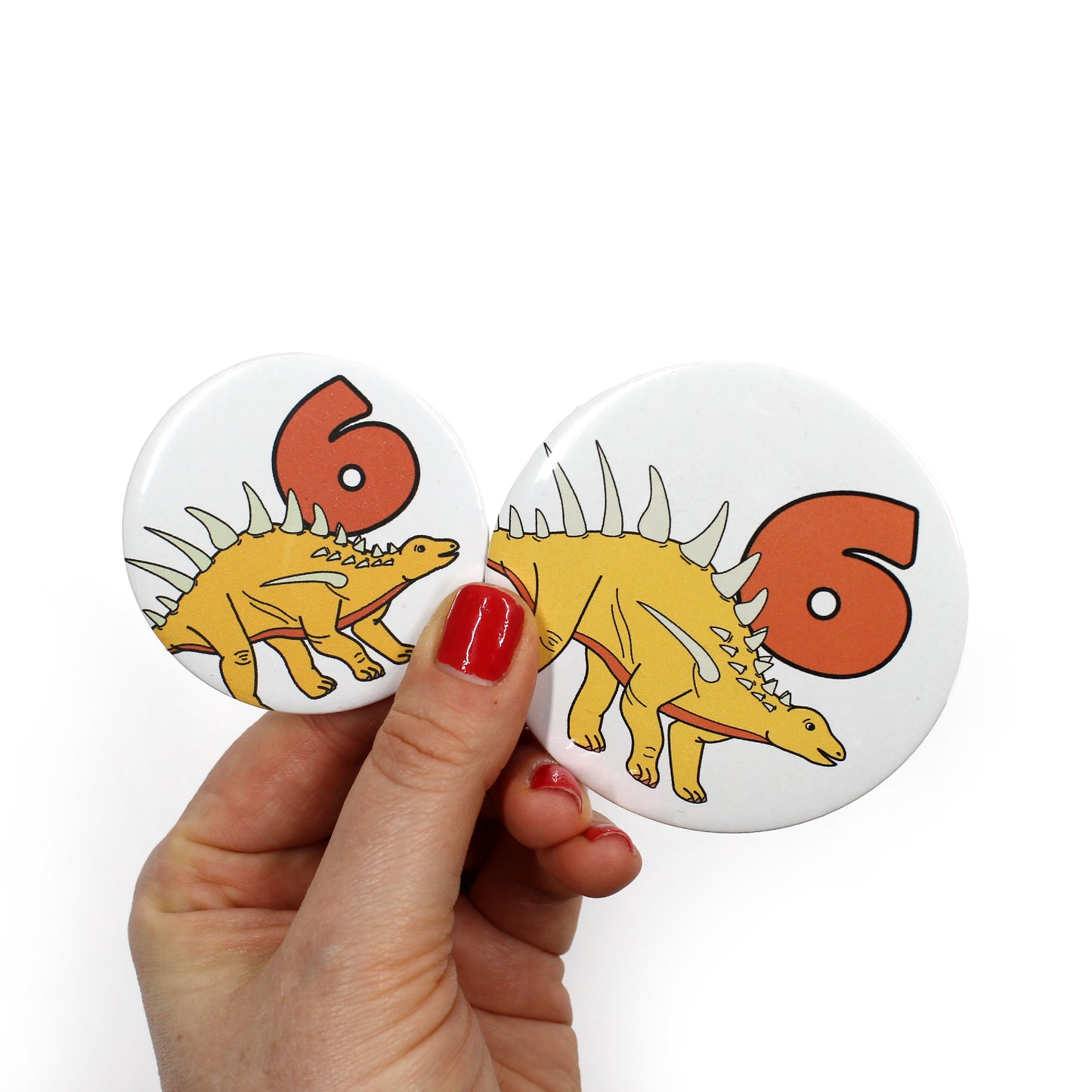 number 6 dinosaur badges