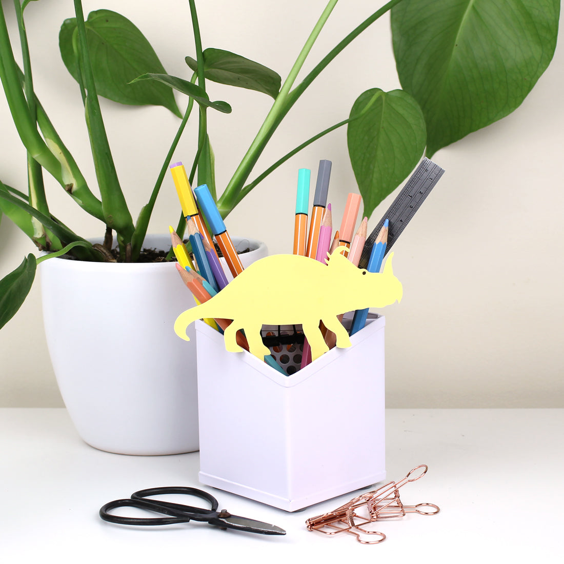 Yellow centrosaurus plant decoration in pen pot