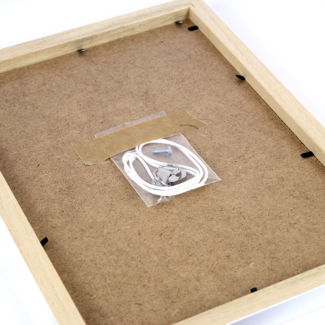 back of the white wood grain frame