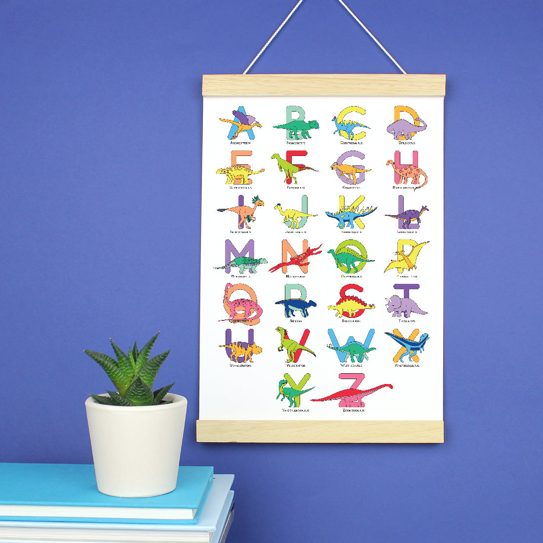 Large Letter Dinosaur Alphabet Poster Print in a wooden strip frame