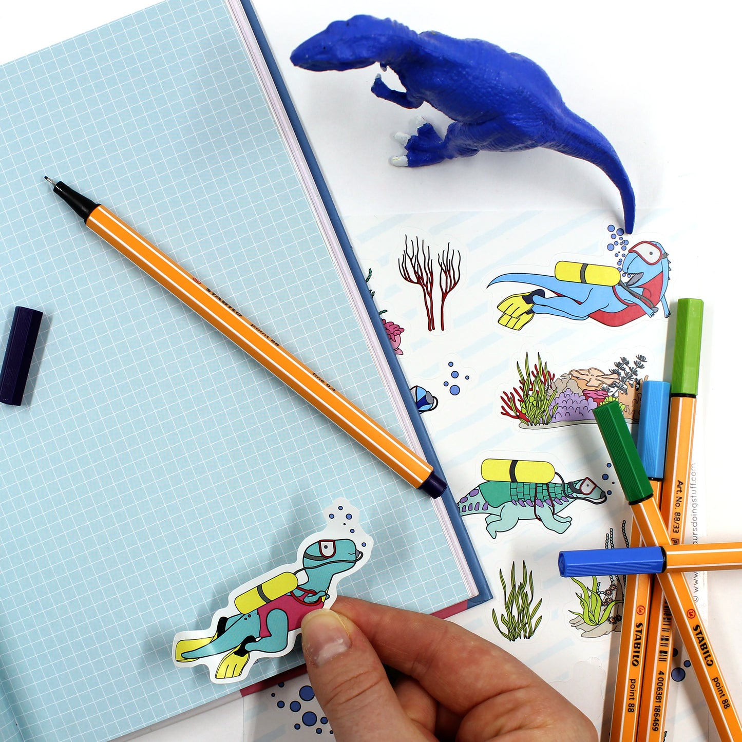 under the water dinosaur sticker on notebook