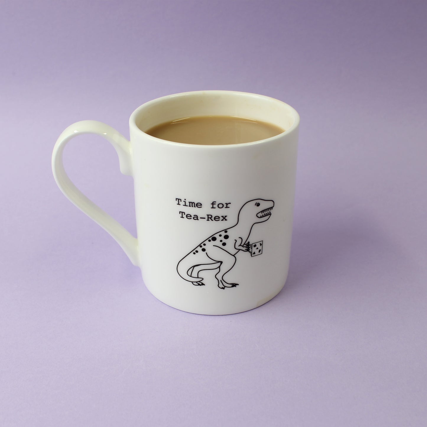 Time for Tea-Rex Mug full of milky tea on a purple background