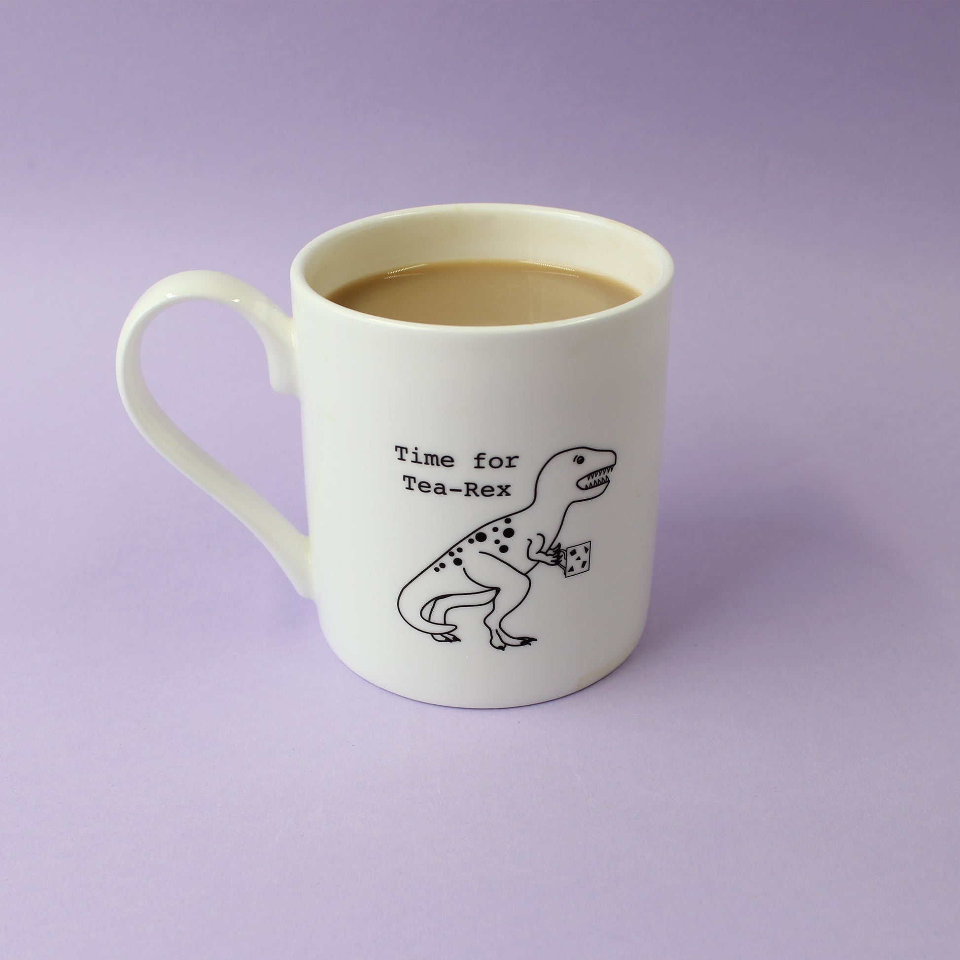 Time for Tea-Rex Mug full of milky tea on a purple background