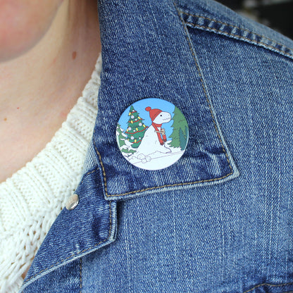 mini snow-rex badge on a denim jacket collar