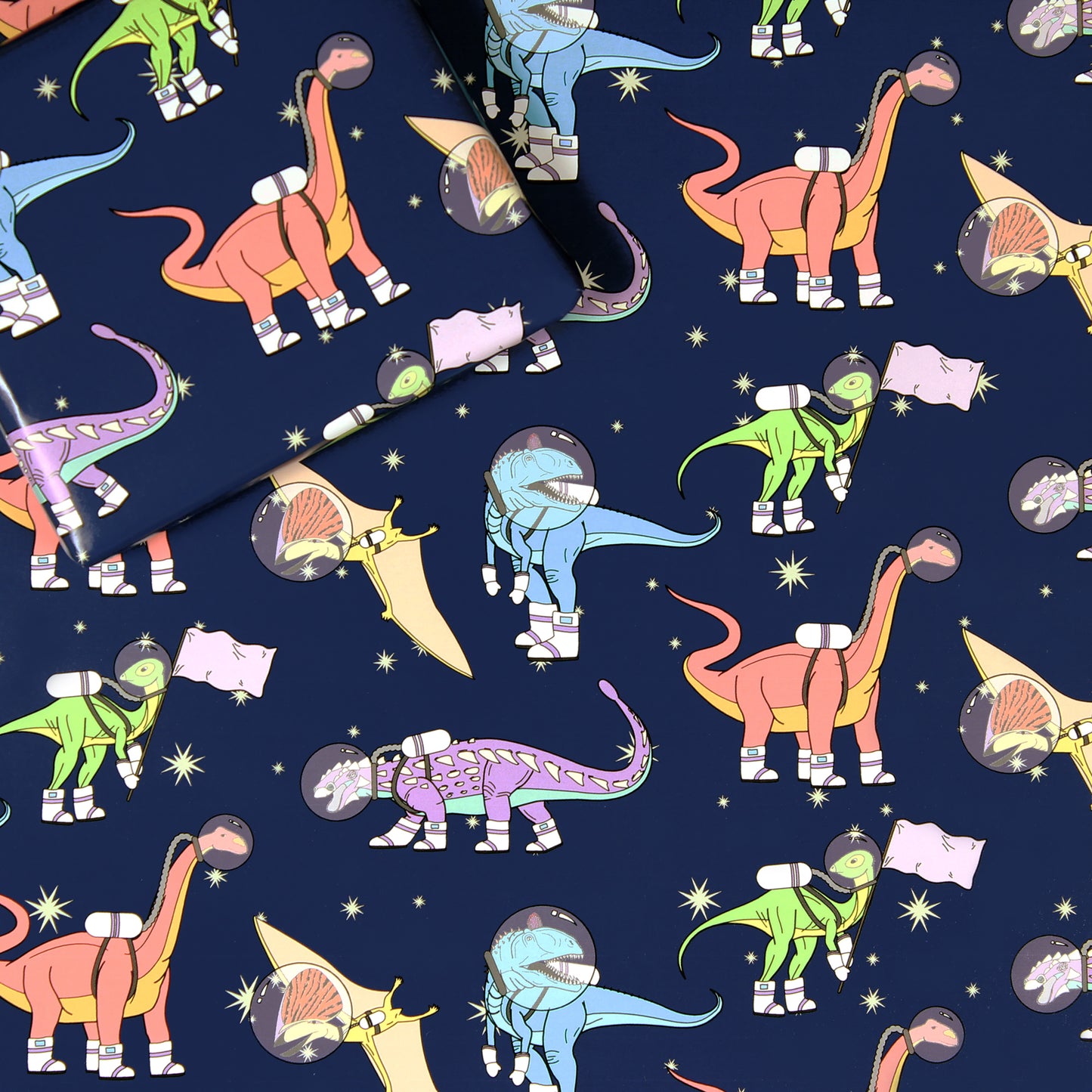 space dinosaur wrapping paper