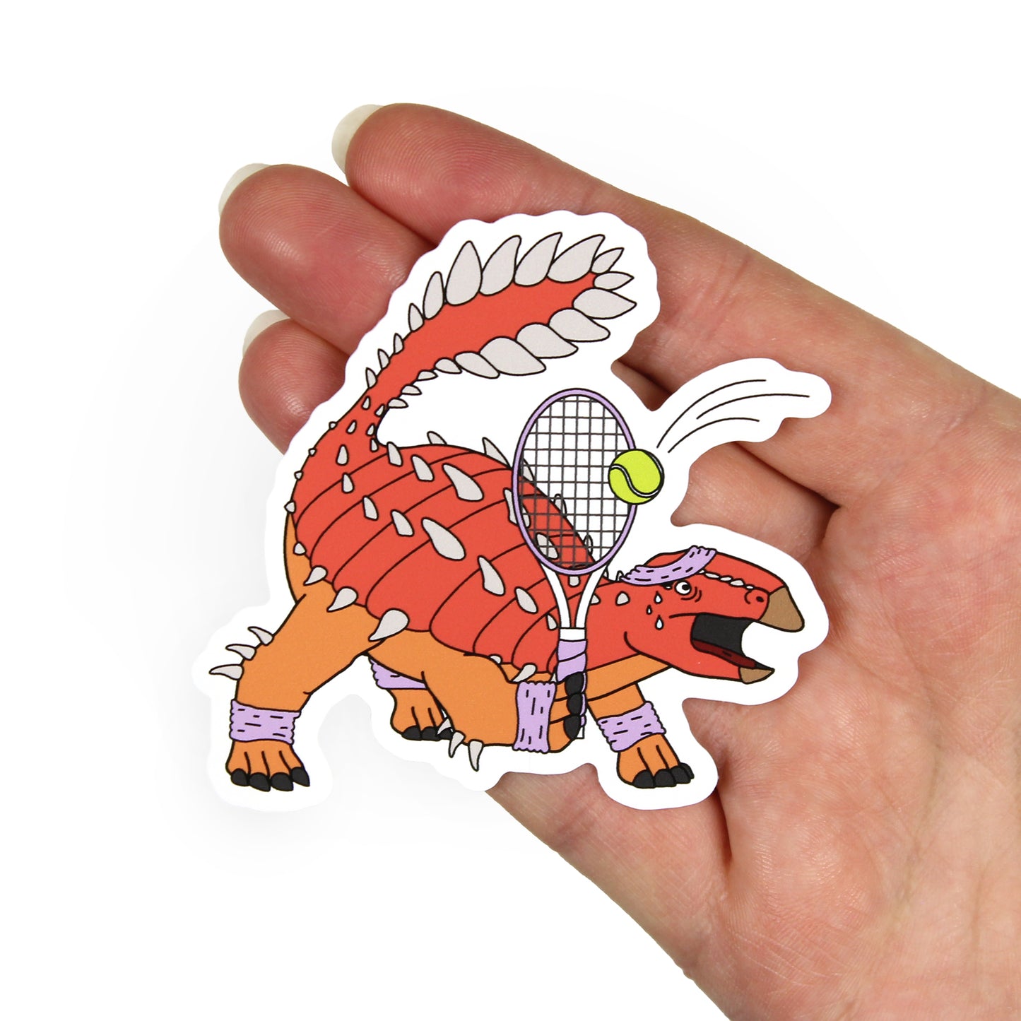 tennis dinosaur sticker on a hand with a white background