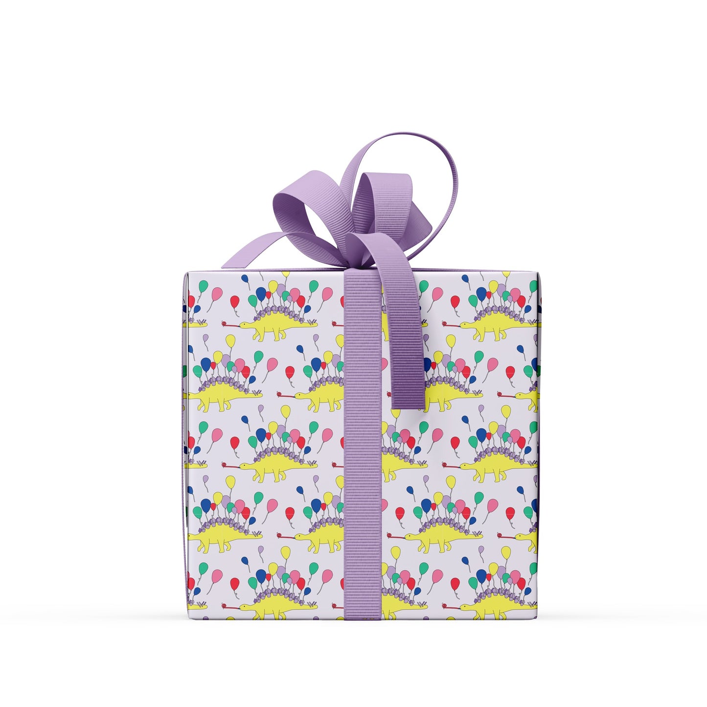 a box covered in stegosaurus party animal wrapping paper