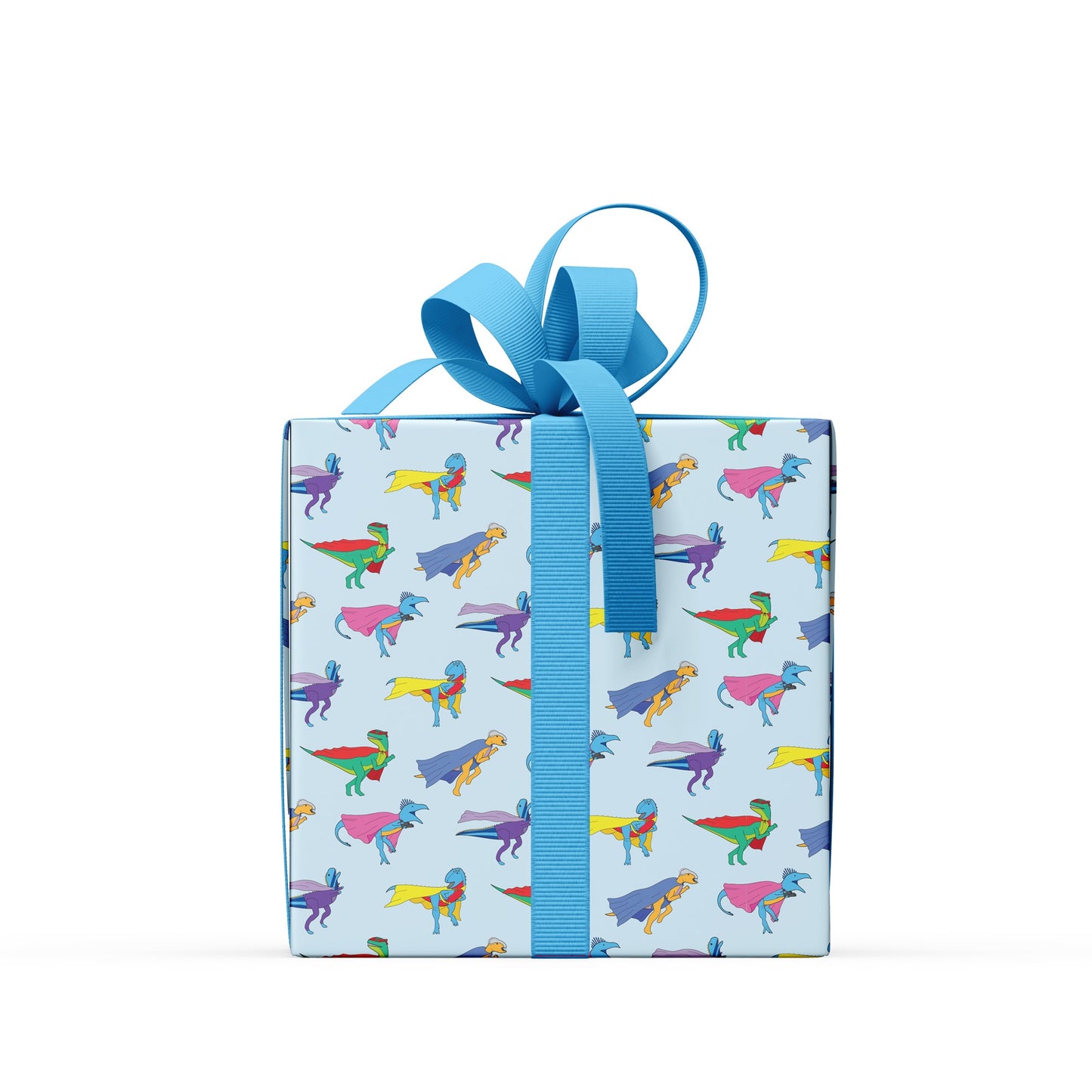 box covered in superhero dinosaur wrapping paper with a blue bow