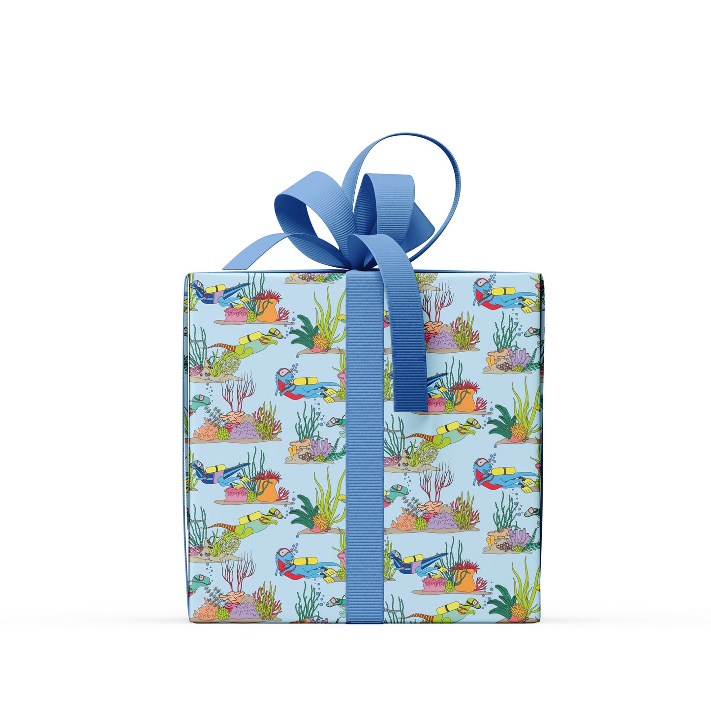 box covered in under the sea dinosaur wrapping paper with a blue bow