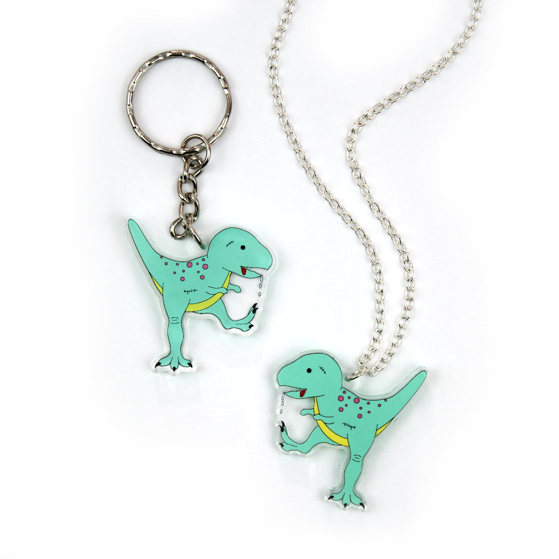 zombie t-rex dinosaur necklace with a matching keyring