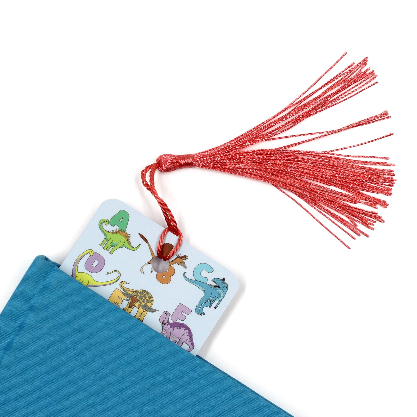 alphabet dinosaur bookmark with a coral tassel coming out of a blue book