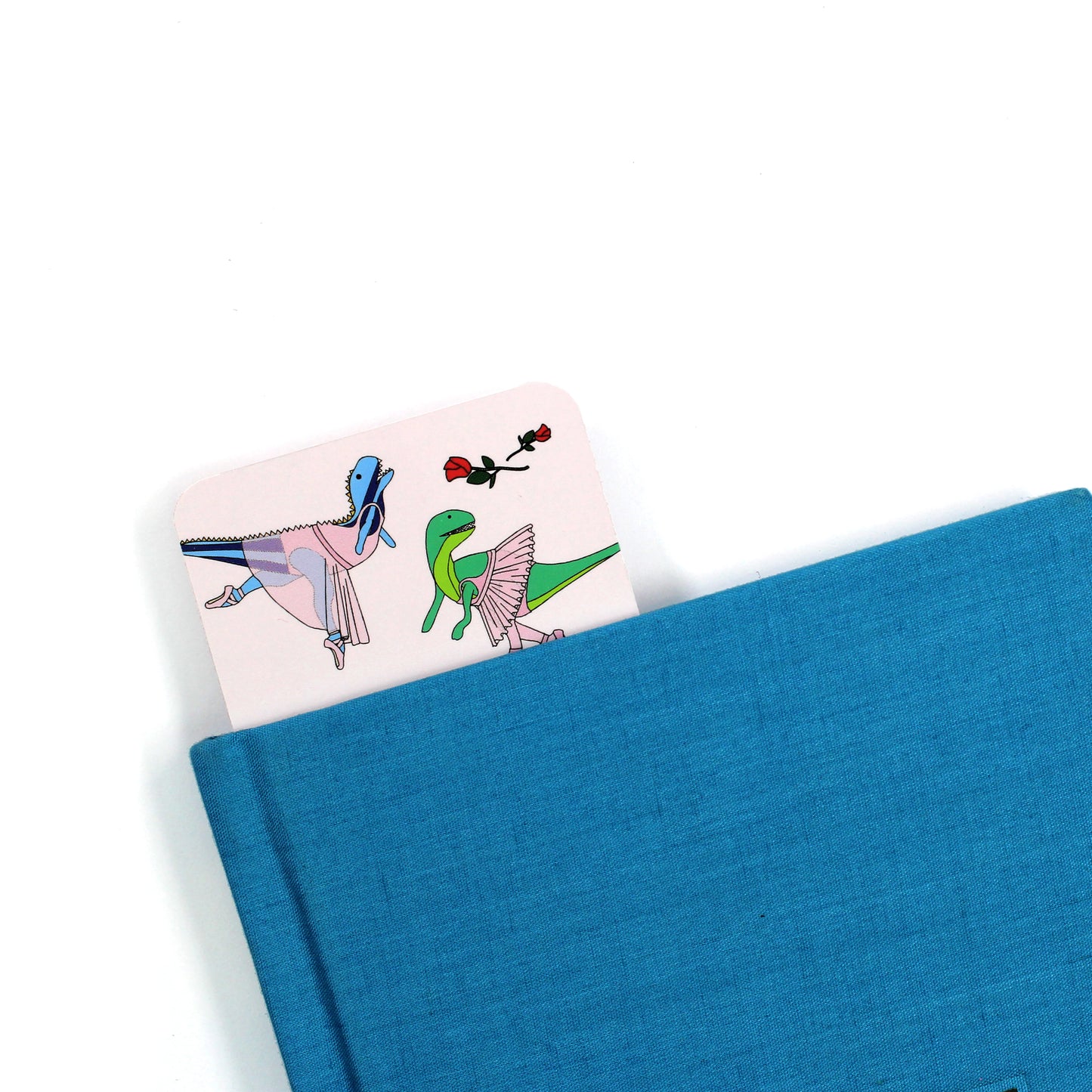 ballet dinosaur bookmark coming out of a blue book