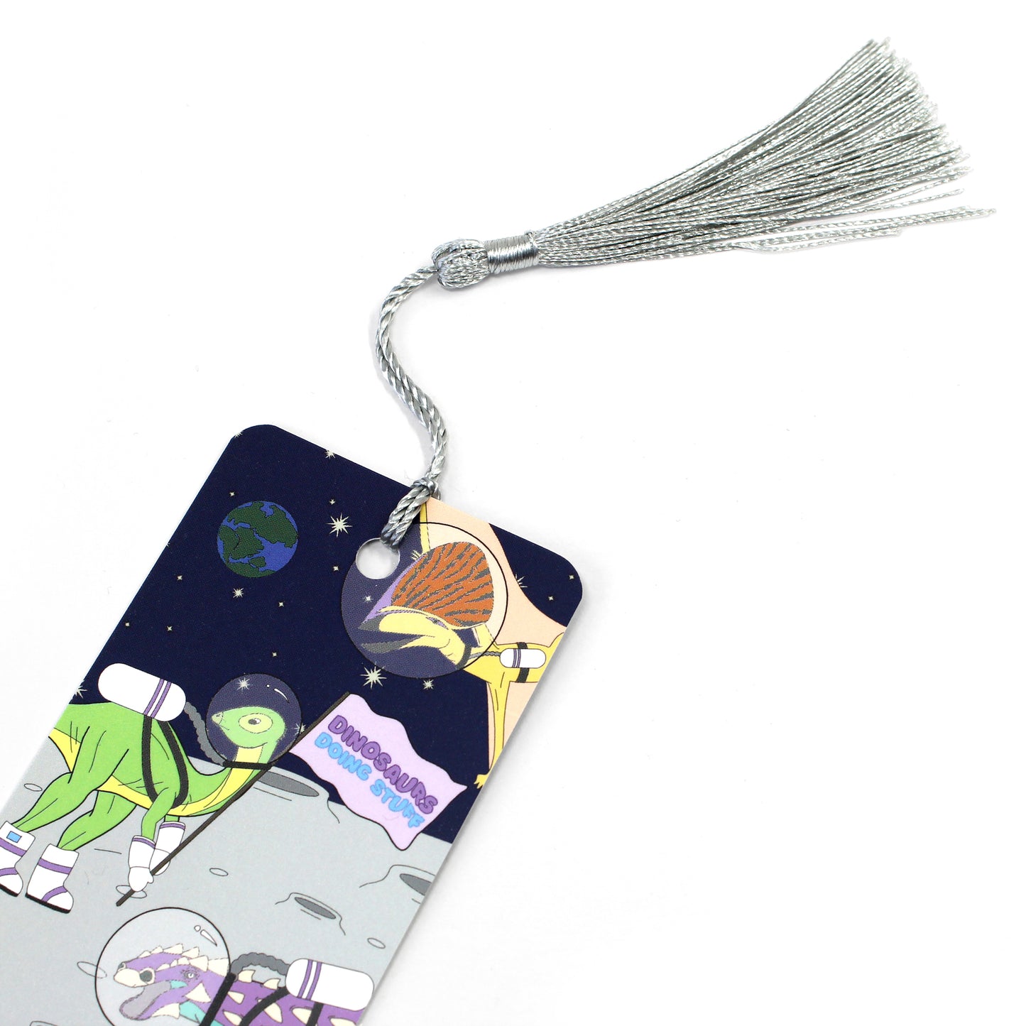 space dinosaur bookmark with a grey tassel