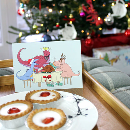 Dinner Dinosaur Christmas Greeting Card on a tray with tarts