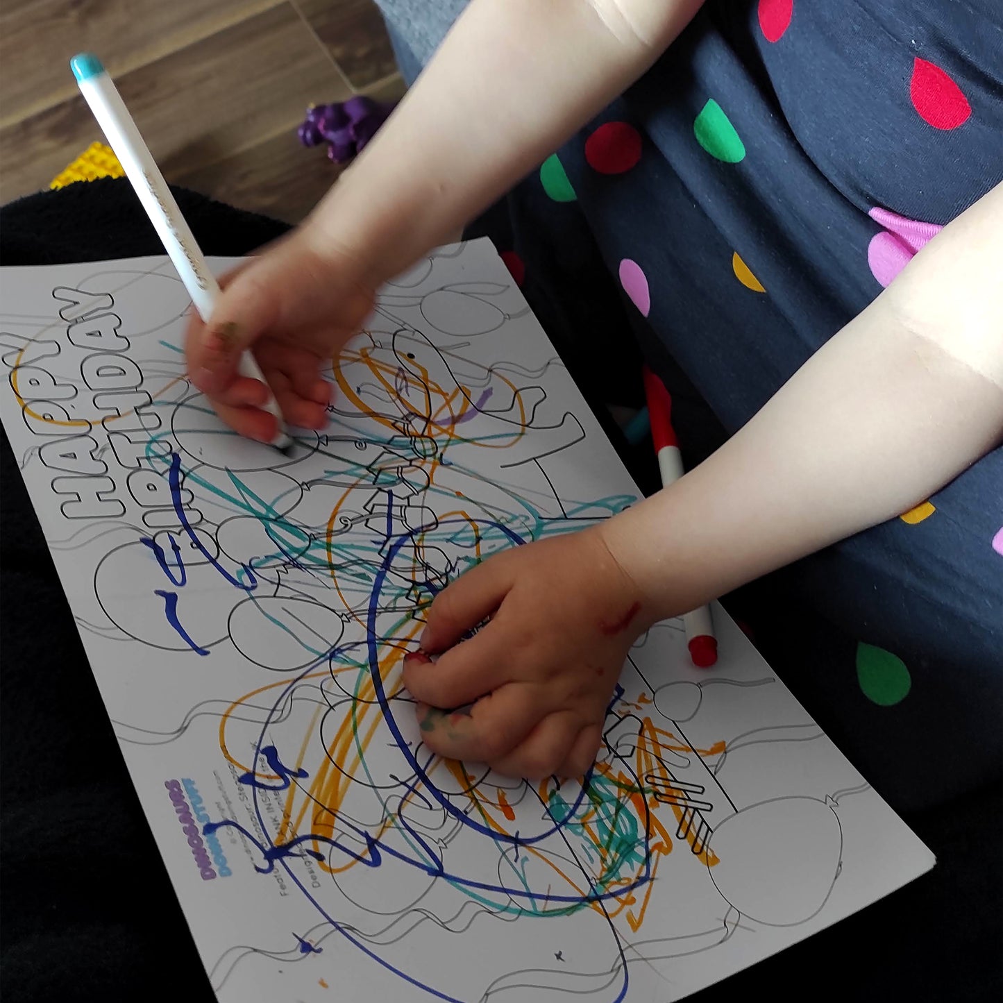 child colouring in the stegosaurus party colouring in greeting card