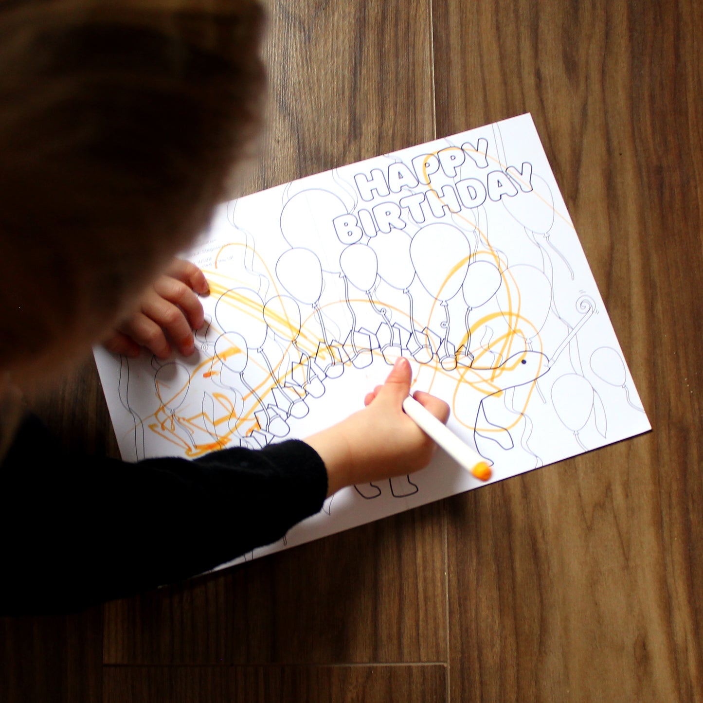 child colouring in the stegosaurus party colouring in greeting card