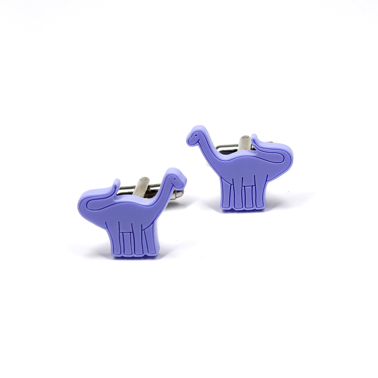 a pair of blue brontosaurus cufflinks on a white background