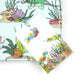 Under the Sea dinosaur gift tag sitting on a box covered with matching wrapping paper