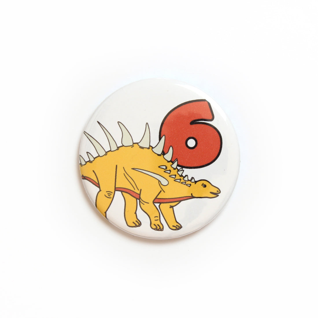 number 6 dinosaur badge