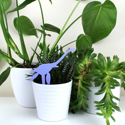 pastel blue plesiosaur dinosaur plant decoration in plant pot