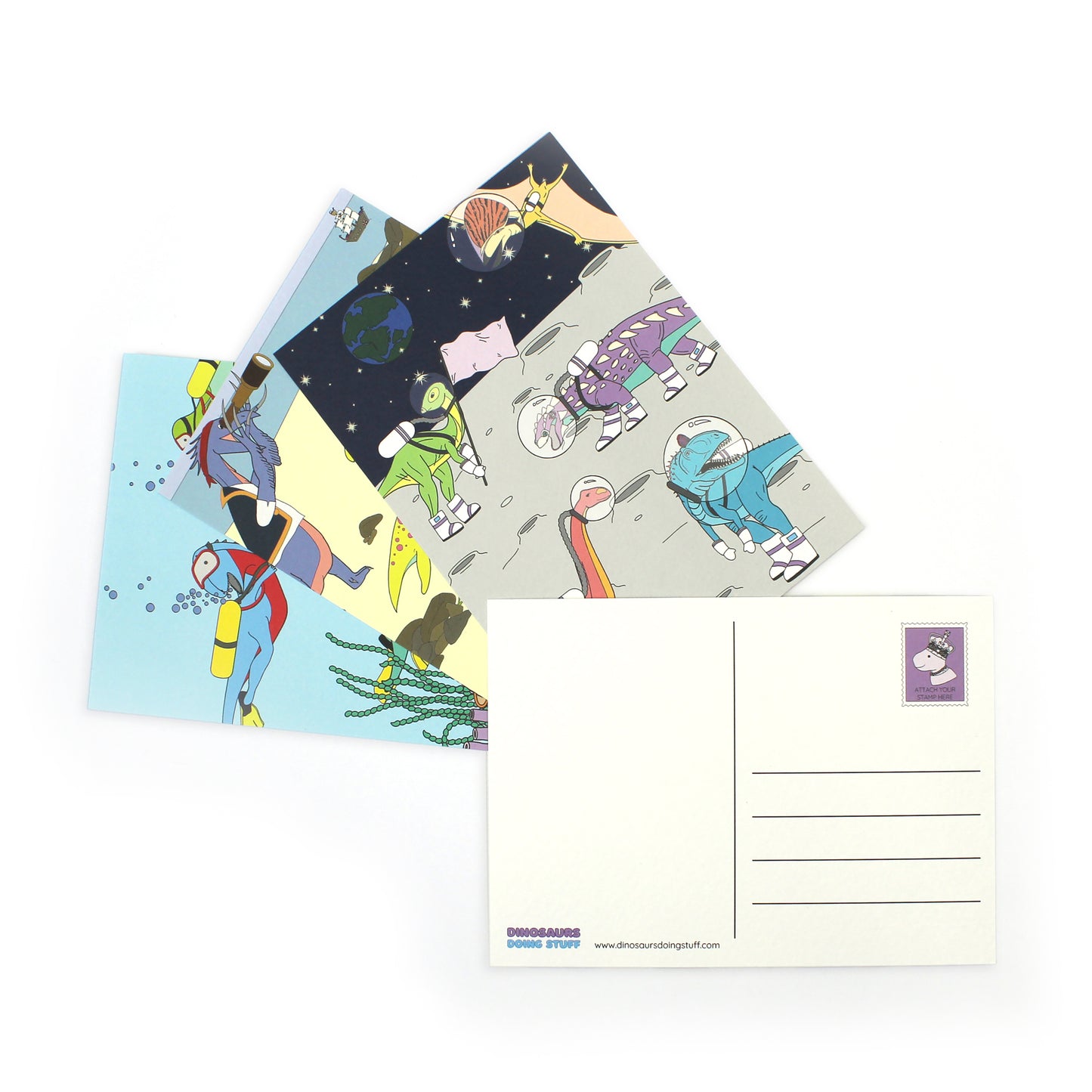 3 dinosaur postcards fanned out with the back of another postcard on top