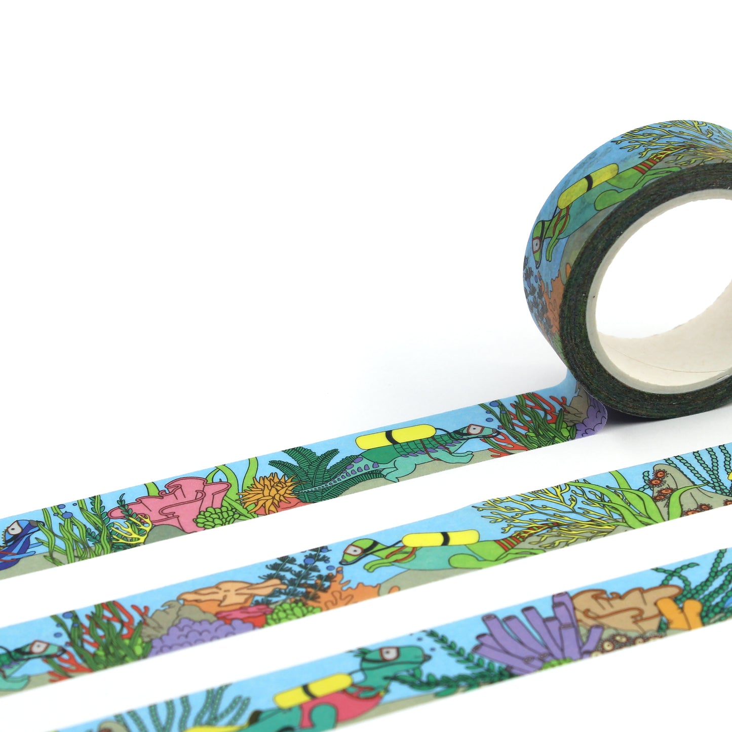 A roll of under the sea dinosaur washi tape rolled out to reveal the whole design