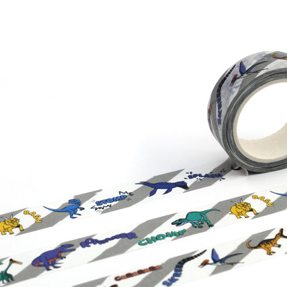 A roll of dinosaur words washi tape rolled out to reveal the whole design
