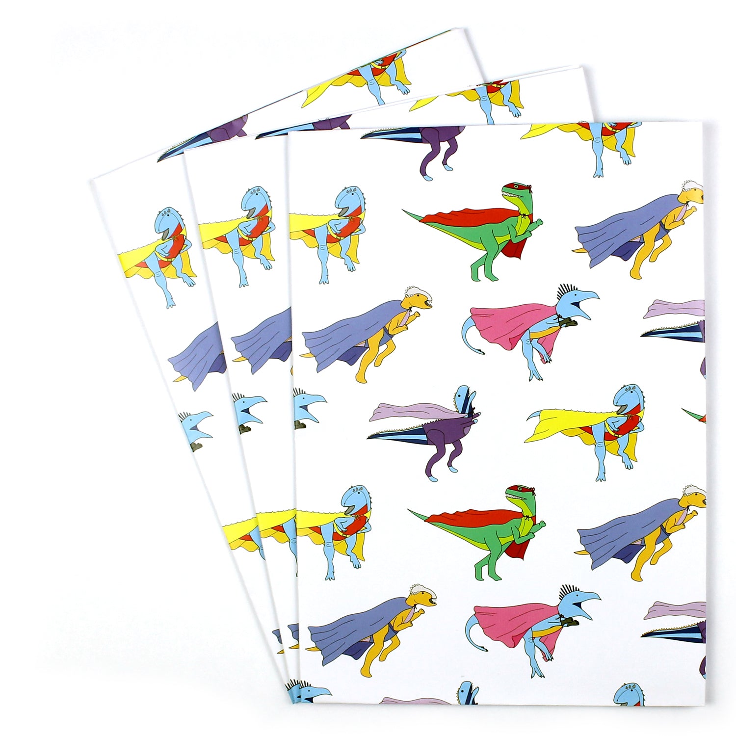 3 sheets of superhero wrapping paper fanned out