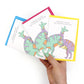 hand holding Congratulations on Your New Hatchling Greeting Cards in blue, pink and yellow