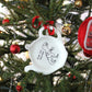 Time for Tea-Rex Teabag Tidy hanging from a red ribbon tied to a Christmas tree